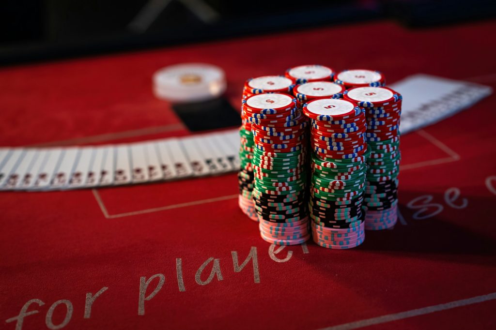 Stacks of Poker Chips and Cards on Casino Table